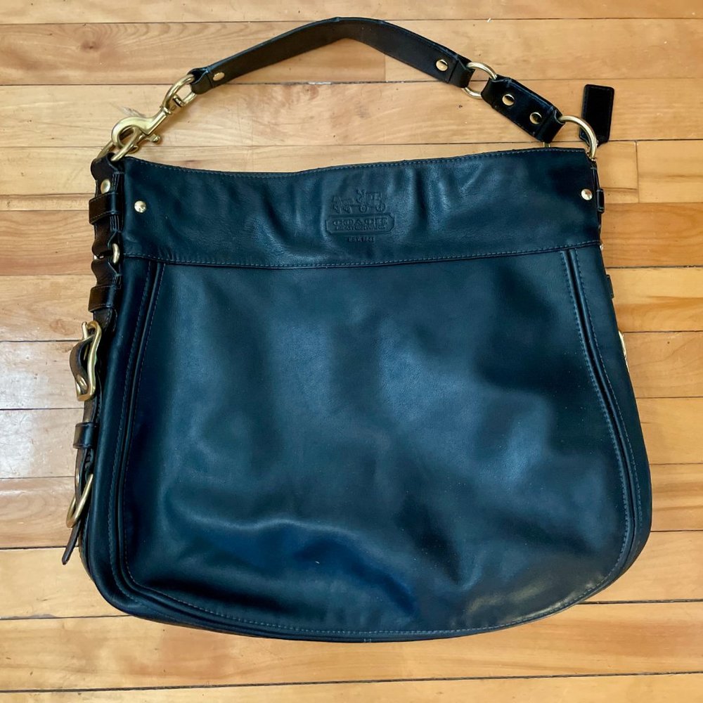 Coach black leather shoulder bag with perfect purple lining